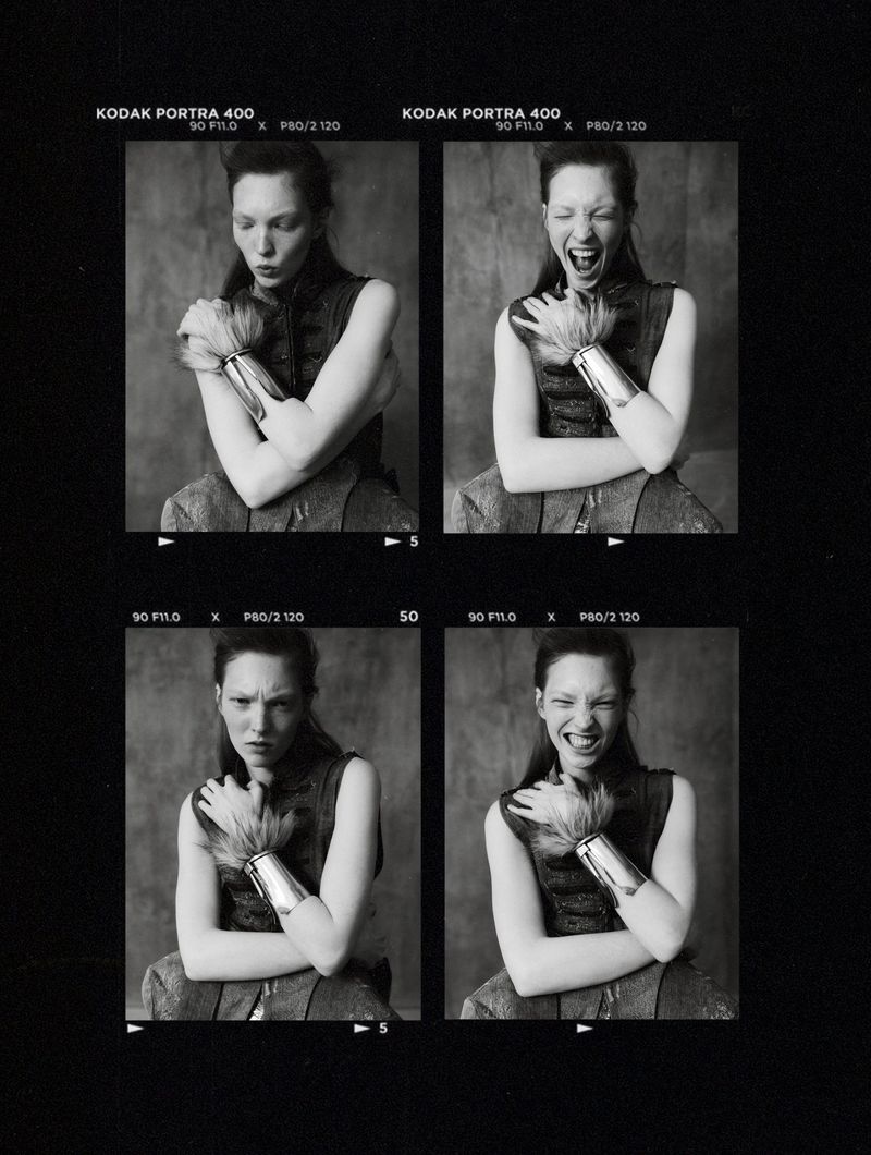 Black and white contact sheet of four portrait frames featuring a female model wearing a metallic cuff bracelet.