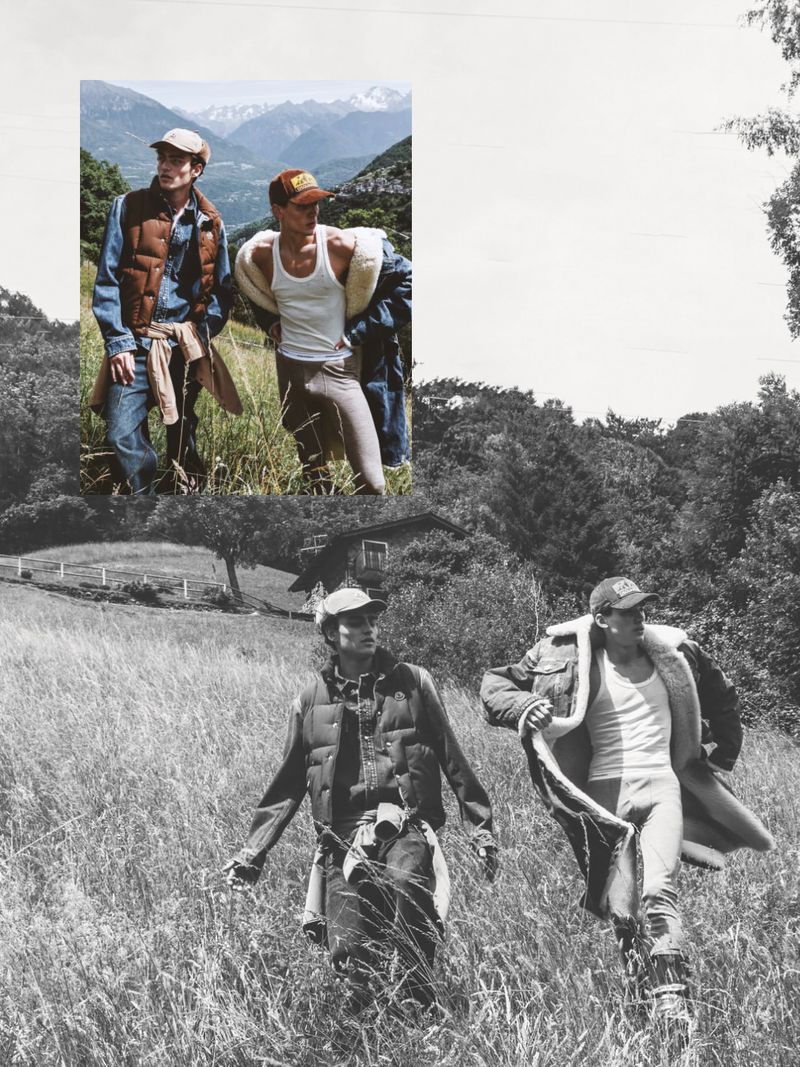 Three male models in casual outdoor attire walking through a grassy meadow with mountain backdrop in Elle Man Thailand