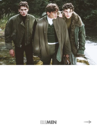Three male models wearing green outerwear standing outdoors near a riverbank for an Elle Man Thailand editorial.
