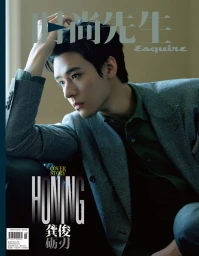 Portrait of Chinese actor Gong Jun wearing a textured grey suit jacket and green shirt for Esquire China magazine cover story.