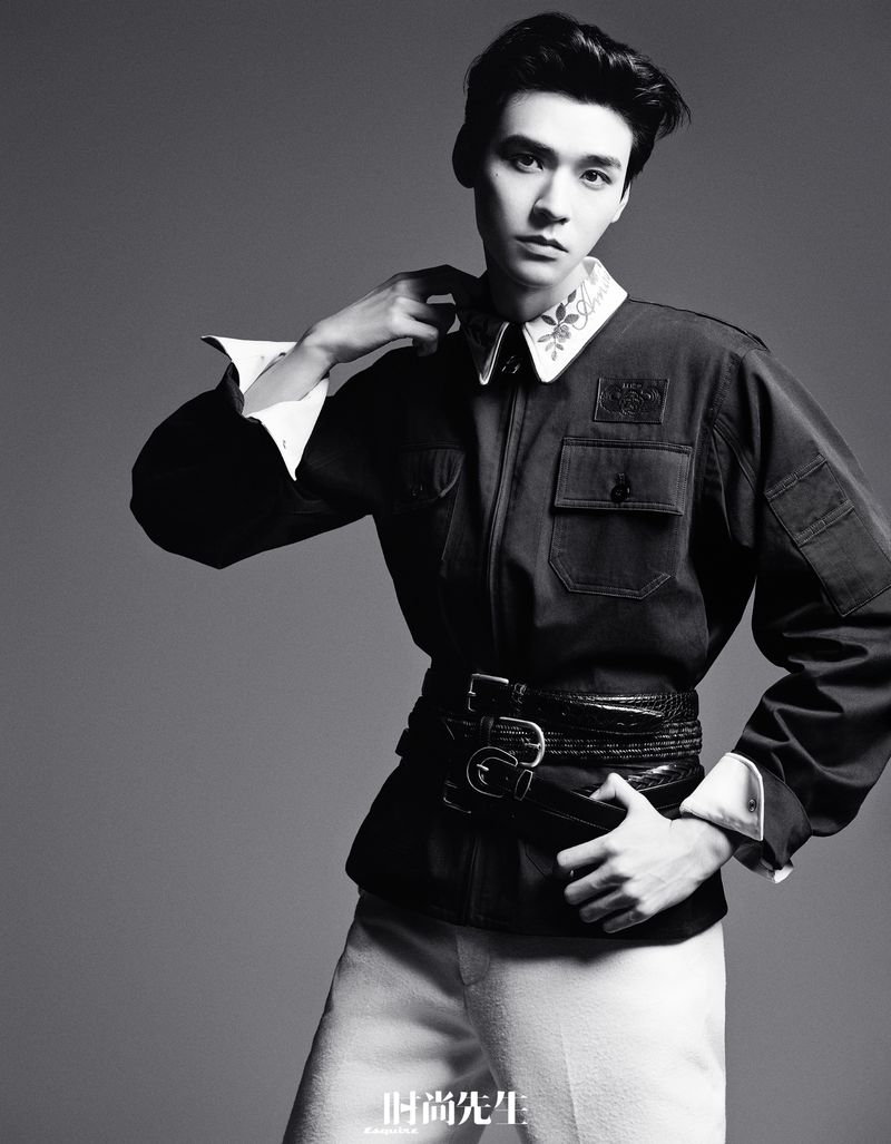 Monochrome portrait of Gong Jun wearing a dark utility jacket with multiple belts for Esquire China editorial