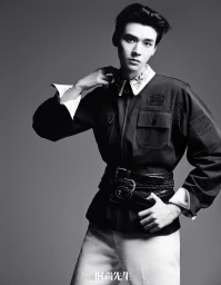 Monochrome portrait of Gong Jun wearing a dark utility jacket with multiple belts for Esquire China editorial