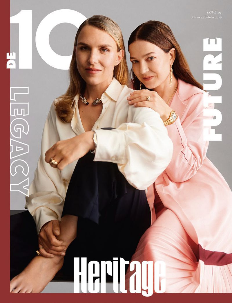 Two women posing together for 10 Magazine Deutsch with Cartier jewelry against a grey background
