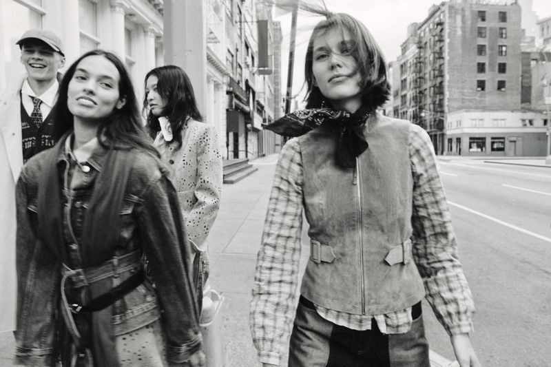Group of four models walking on a city street in black and white fashion campaign photography for Zara Western Codes.