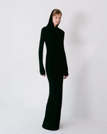 Model wearing a long black hooded dress against a plain white background for the Colleen Allen Spring Summer 2027 collection.