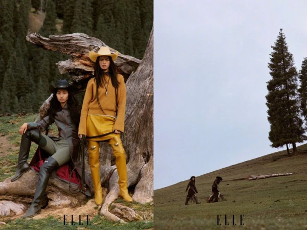 Two models wearing cowboy hats and western-inspired outfits pose outdoors near a large fallen tree trunk.