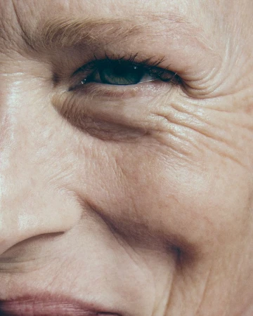 Macro portrait focusing on the eye and textured skin of male model Richard Biedul for Vogue Portugal editorial Up Close and Personal