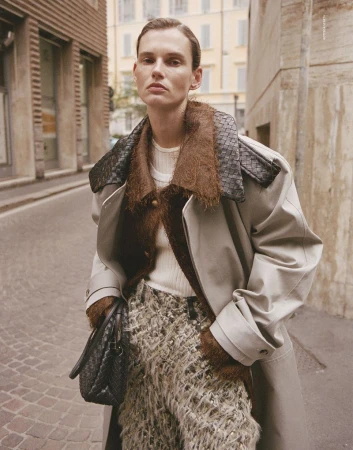 Model Giedre Dukauskaite in an oversized coat on a city street for Love Want Magazine