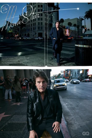 Tom Cruise standing on a city street at night wearing a dark coat for GQ Magazine U.S.
