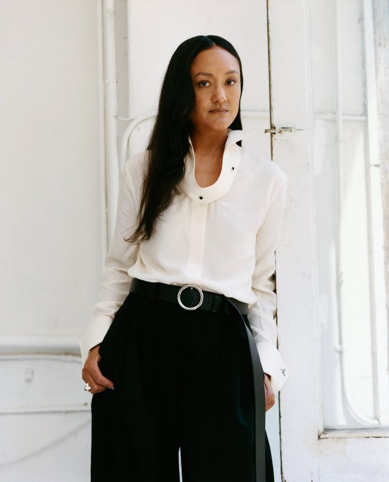 Portrait of Autumn Durald Arkapaw wearing a white blouse and black trousers for The Gentlewoman portrait series