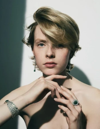 Portrait of a model wearing diamond and emerald high jewellery, photographed by Alexandra Utzmann for SCMP Style.