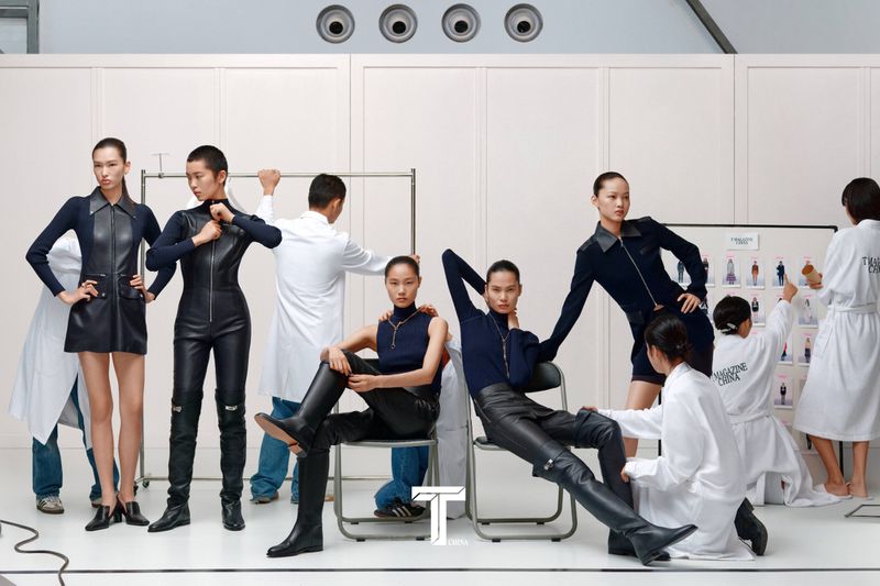 Group of models and stylists in a studio setting posing for T Magazine China captured by photographer Liu Song