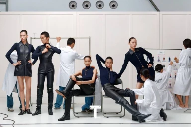 Group of models and stylists in a studio setting posing for T Magazine China captured by photographer Liu Song