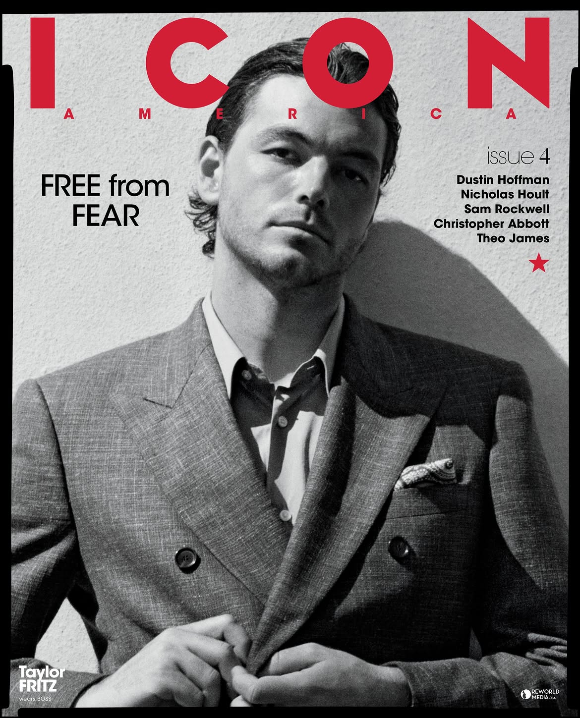 Portrait of tennis player Taylor Fritz wearing a grey double-breasted suit against a textured wall for ICON America magazine cover.