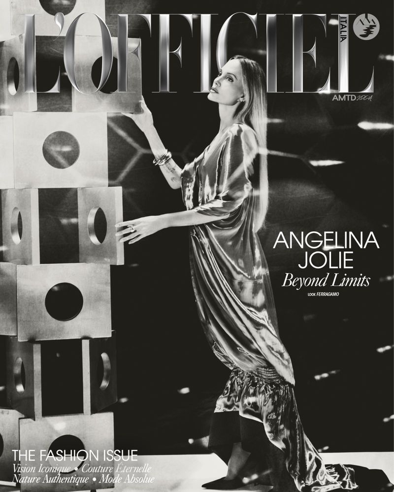 Angelina Jolie posing in a shimmering dress beside a stacked block sculpture for L'Officiel Italia magazine cover editorial