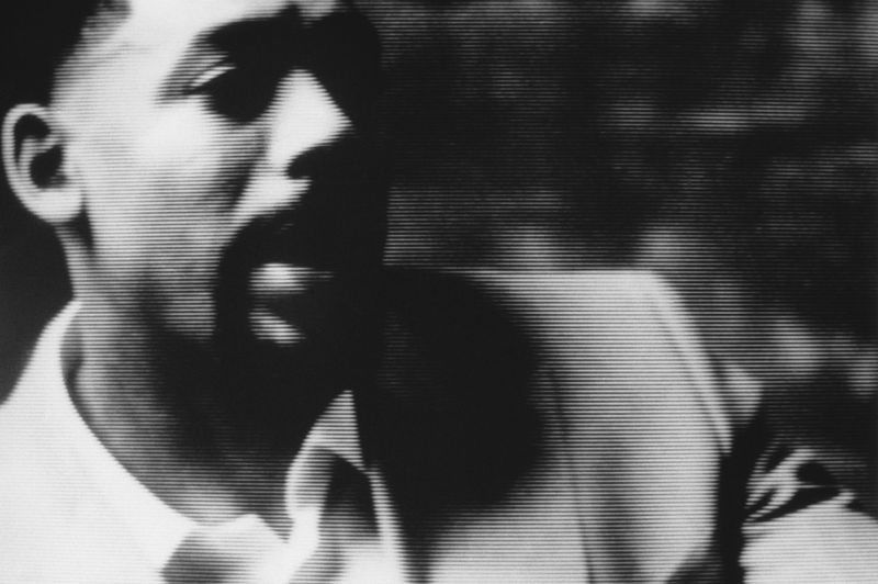 Portrait of actor Aaron Pierre rendered with heavy horizontal scan lines in a high-contrast black and white aesthetic for HERO Magazine.