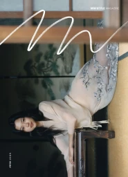 Model Mika Schneider reclining in a sheer dress on tatami mats for Modern Weekly China cover photographed by Tess Ayano