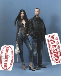 Two models wearing Diesel denim apparel against a blue backdrop with overlaid product information tags