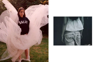 Editorial portrait of a young woman wearing a black hoodie and voluminous white tulle fabric standing outdoors in a garden