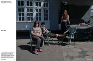 Three models posed in an outdoor driveway with plastic chairs and a covered car for Dazed Magazine editorial project Dog Days.