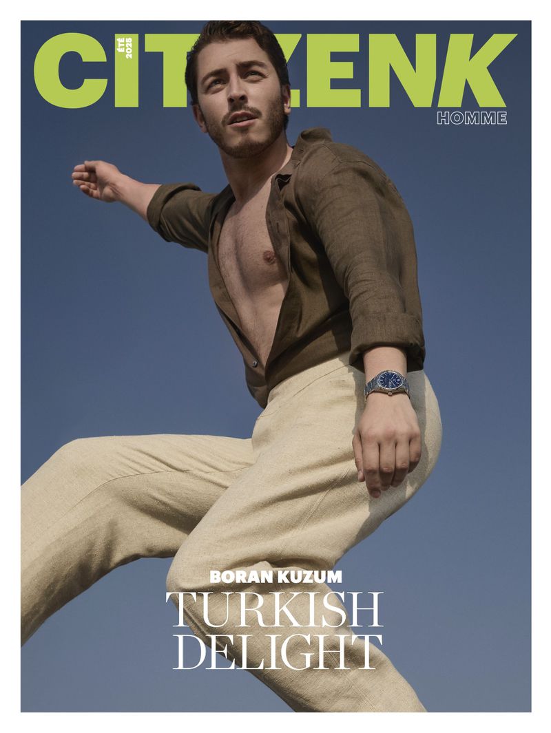 Magazine cover featuring a stylish male model wearing a linen shirt and pants against a blue sky, showcasing fashion and editorial design.