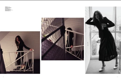 Editorial collage of a woman with dark curly hair wearing a dark jacket and skirt on a staircase with white railings