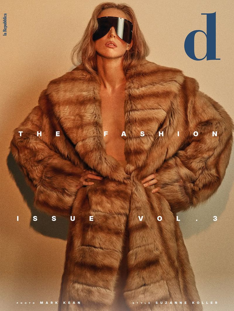 Model wearing a brown fur coat and dark visor sunglasses against a neutral background for D Repubblica