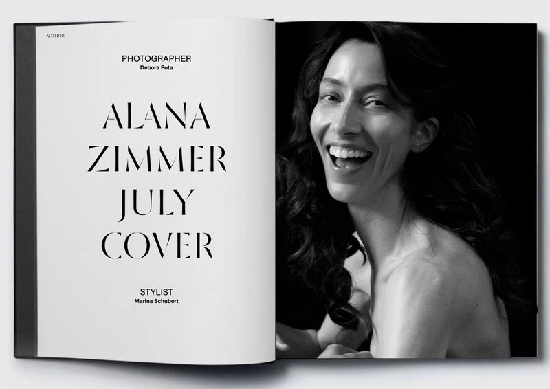 Magazine spread featuring Alana Zimmer on the right page, smiling with dark, wavy hair, set against a dark background with text on the left page.