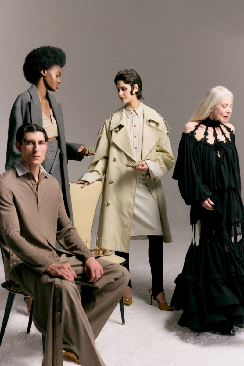 Group of four fashion models in contemporary apparel posing against a neutral studio background for Mixte magazine.