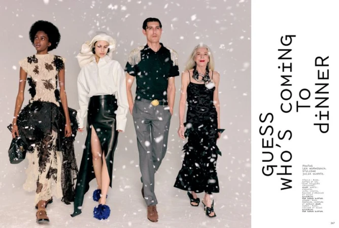 Four diverse models posing in high fashion winter apparel against a pale grey backdrop with falling snow effects