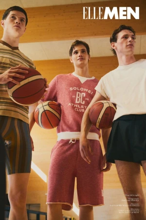 Three male models holding basketballs in an indoor wooden court for Elle Men Thailand editorial shot by Eugenio D'Orio.