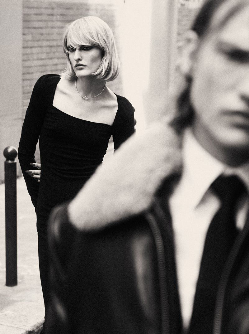 Monochrome fashion editorial featuring a model in a black top and a man in the foreground for Mixte project Perfect Strangers