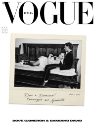 Vogue Italia October 2026 magazine cover featuring a black and white polaroid of Dove Cameron and Damiano David on an antique bench.