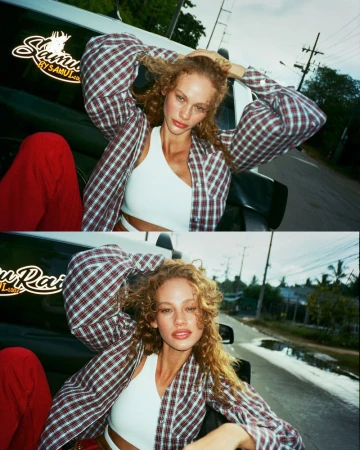 Model with curly hair in a plaid shirt posing outdoors near a car for Vogue Netherlands, photographed by Jorin Koers.