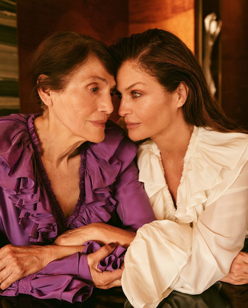 Two women posing together closely with their heads touching in an intimate portrait for Vogue Czechoslovakia.