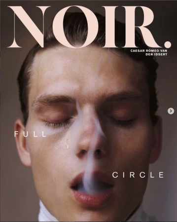 Close-up portrait of a young man with eyes closed and smoke drifting past his face for Noir Magazine cover editorial