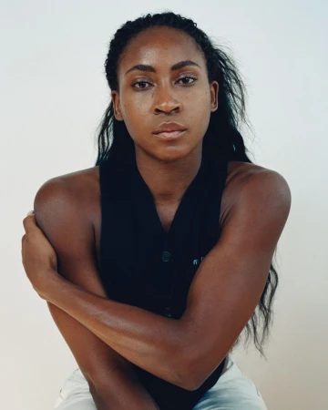 Coco Gauff portrait wearing a black sleeveless top against a white background for The Gentlewoman