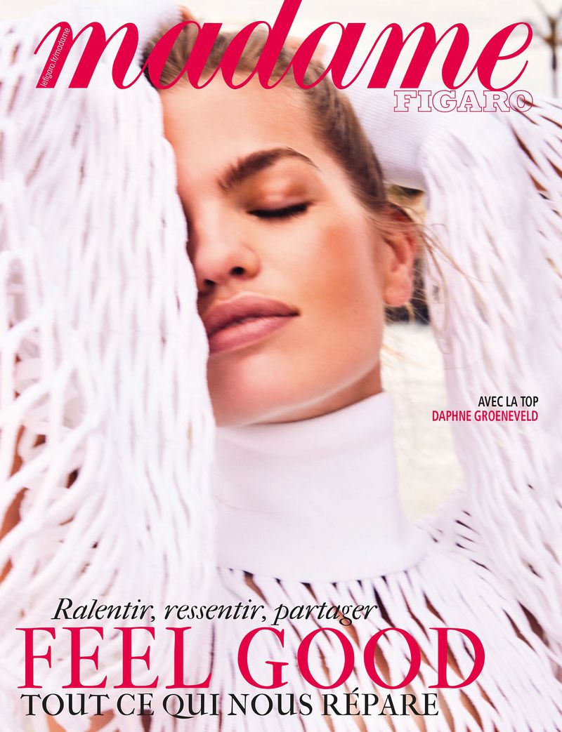 Madame Figaro cover featuring a close-up of model Daphne Groeneveld, eyes closed, wearing a white high-neck top with fringed details.