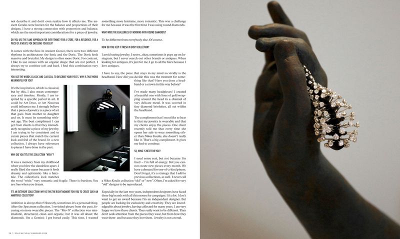 Elegant diamond jewelry is showcased on a bronze hand sculpture, blending luxury with art and craftsmanship in a sophisticated display.