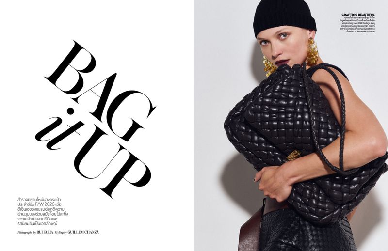 Model Hana Jirickova wearing a black beanie and holding a large woven leather handbag for Vogue Thailand.
