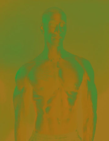 Portrait of a shirtless man with arms down against an olive green and golden background with a color grade effect