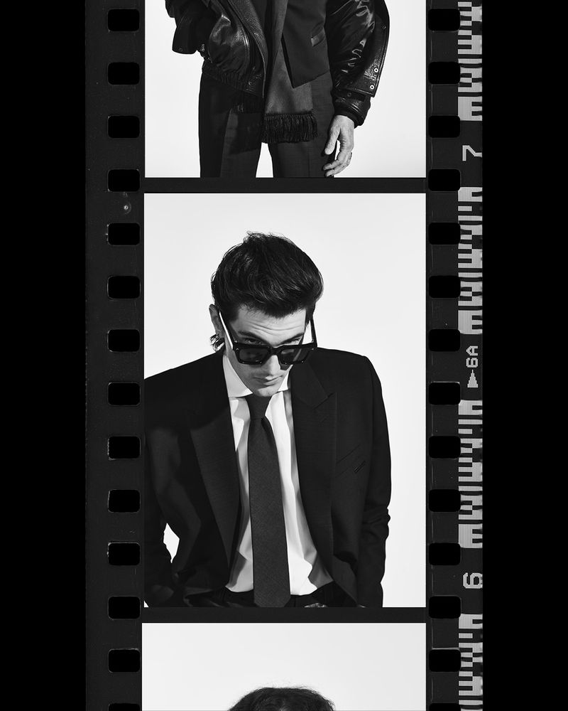 A black and white photo strip features a man in a suit, sunglasses, and a tie in the middle frame with blurred figures above and below.