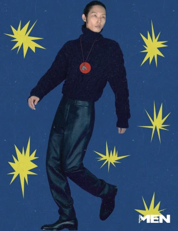 Model Xu Meen in a dark turtleneck and trousers against a blue background with yellow star graphics for Noblesse Korea.