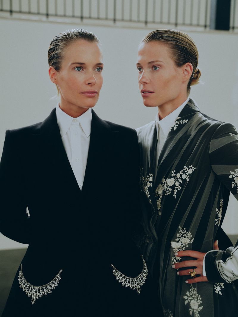 Portrait of Lady Amelia Spencer and Lady Eliza Spencer wearing tailored jackets for Vanity Fair U.S.