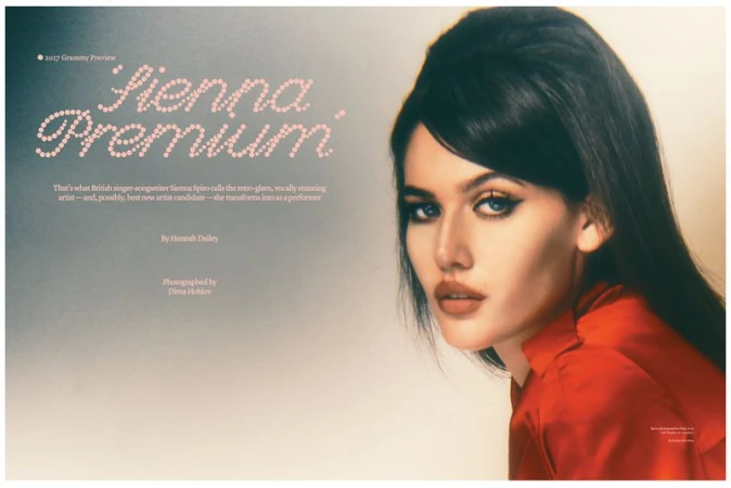 Portrait of singer Sienna Spiro in a red top with voluminous dark hair and winged eyeliner for Billboard Magazine editorial