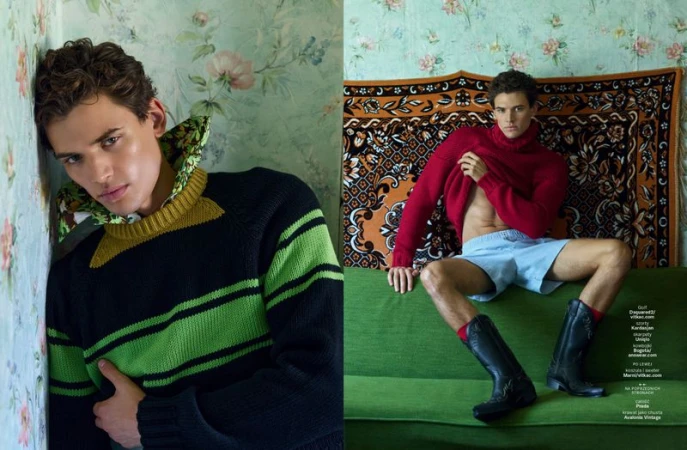Male model in a colourful sweater leaning against a floral wallpaper background for GQ Poland editorial photography