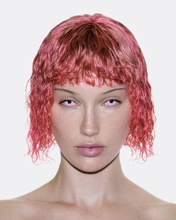 Portrait of Meredith Duxbury with wet pink bob hair and light pink eyes against a plain white background