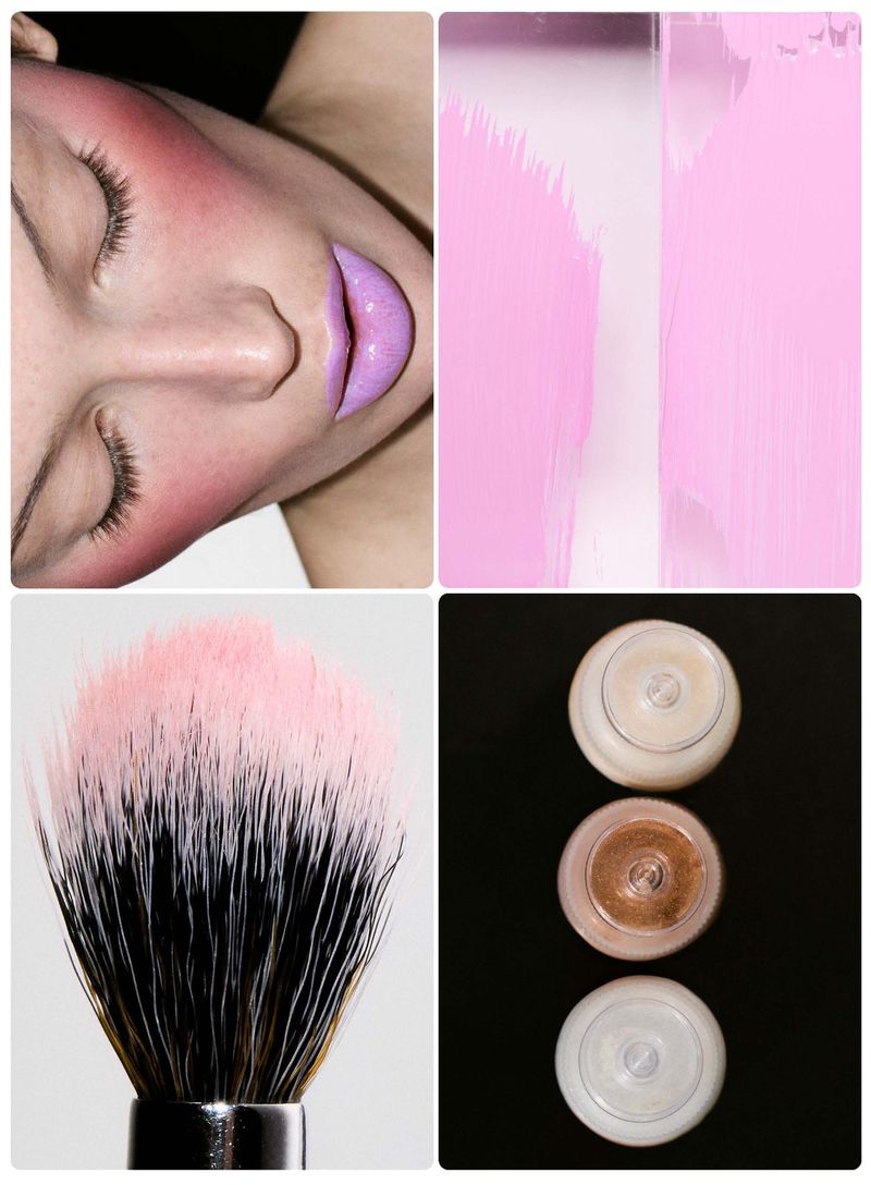 Close-up beauty portrait of Meredith Duxbury with purple lipstick, makeup brush with pink powder, pink paint stroke, and product jars