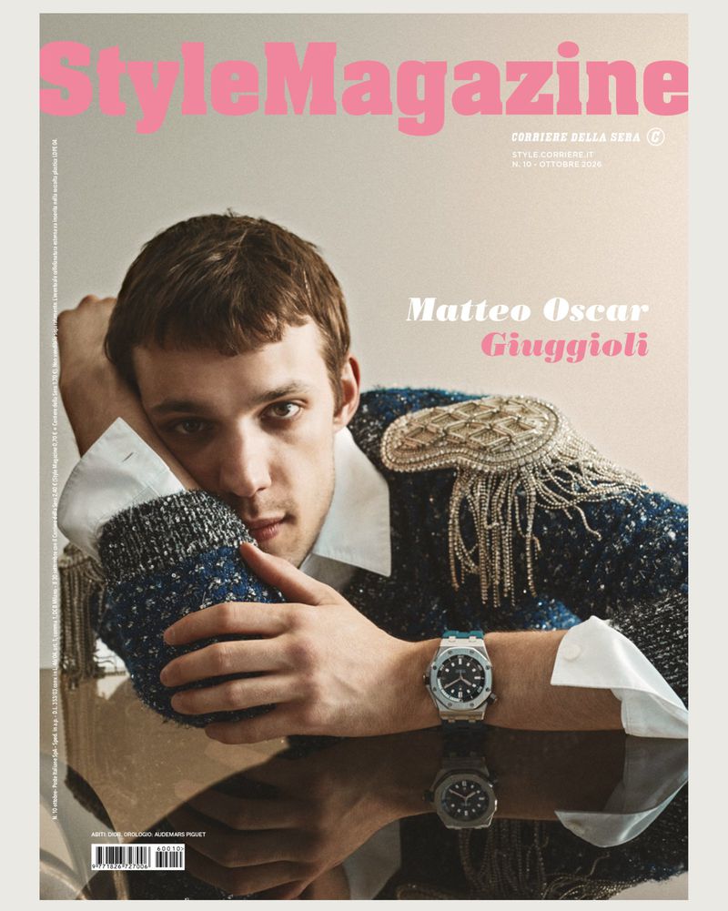 Close-up portrait of young man in embroidered tweed sweater and luxury wristwatch for Style Magazine Italy cover