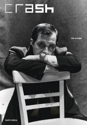 Monochrome portrait of Karim Leklou resting arms on the back of a white wooden chair for Crash Magazine